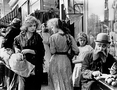 Lillian Gish in The Musketeers of Pig Alley (1912)